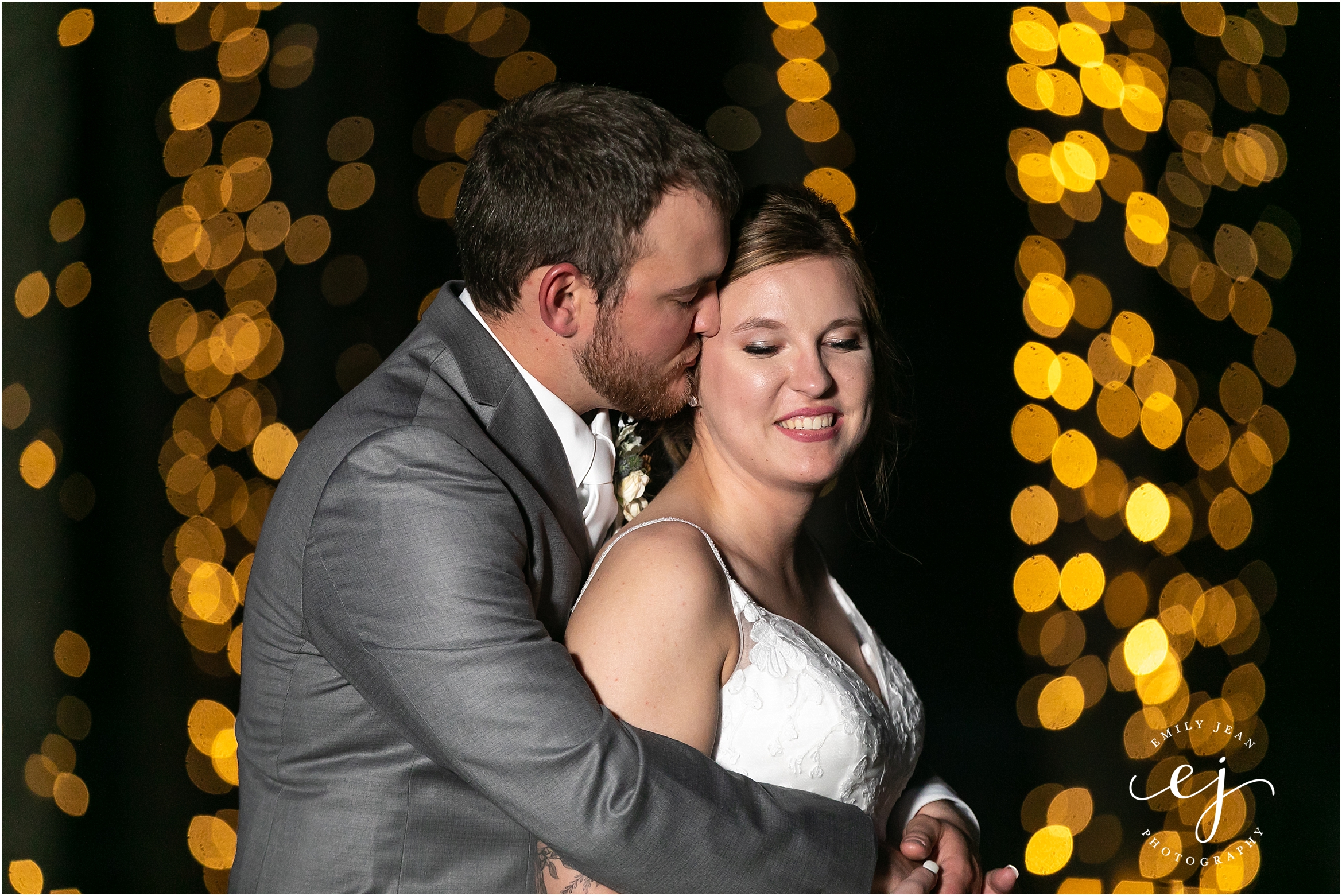 Celebrations on the River Photographer Bride and Groom with twinkle lights