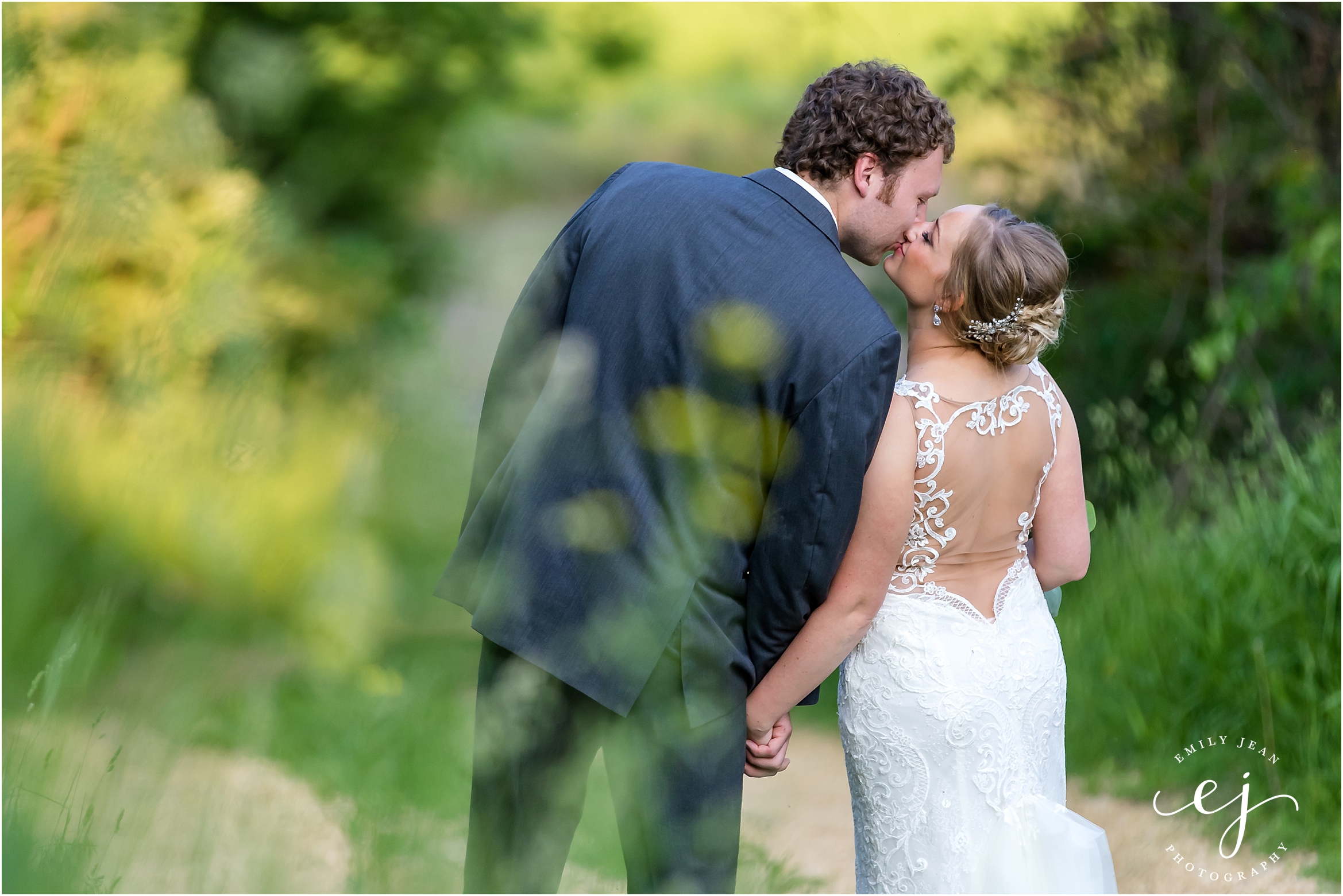 Stoney Creek Wisconsin Summer Wedding bride and groom kiss