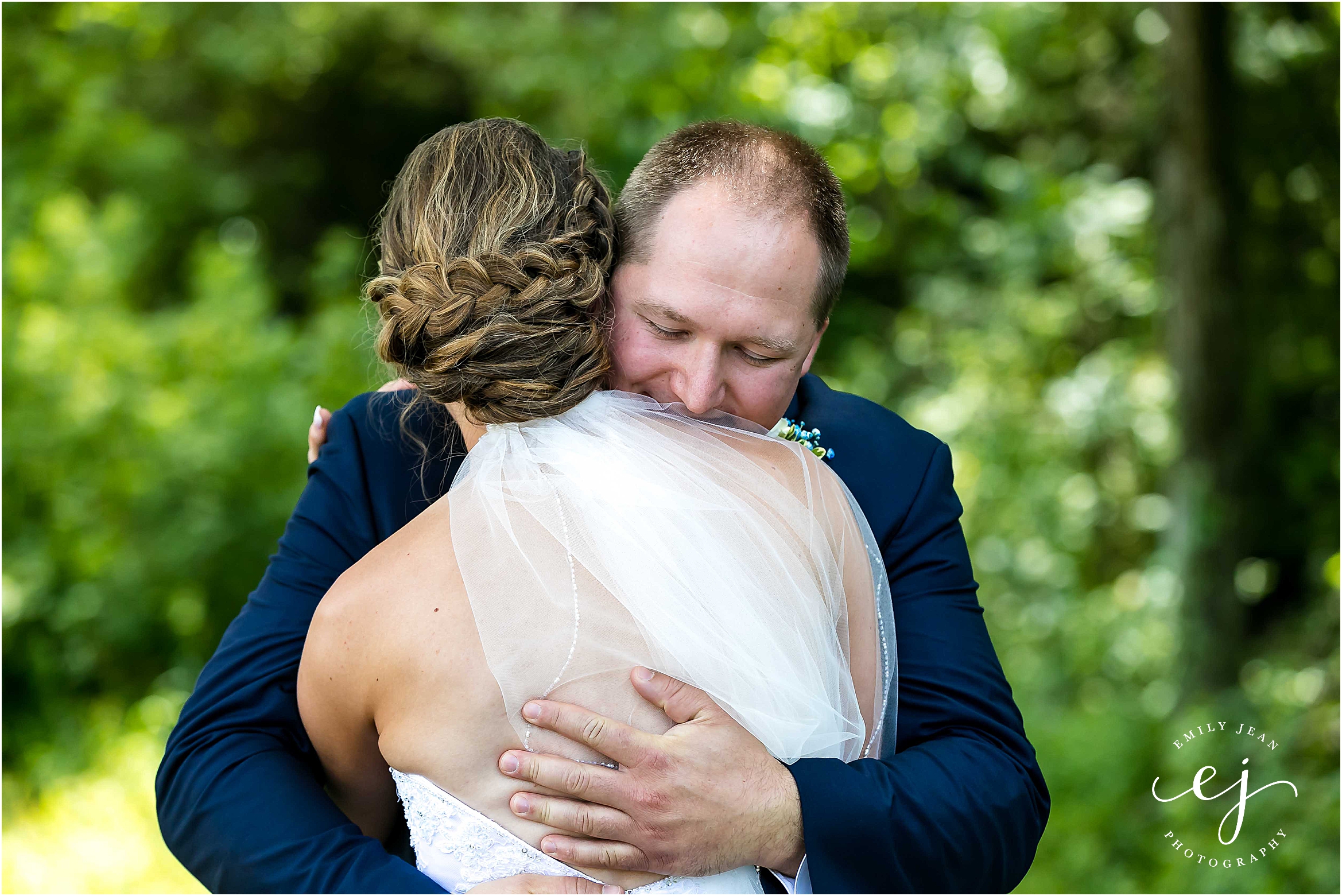 wisconsin wedding photographer first look forest outside