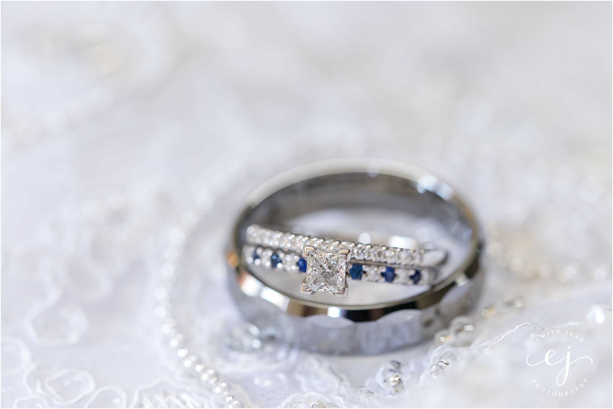silver and blue diamond wedding rings wisconsin wedding photographer