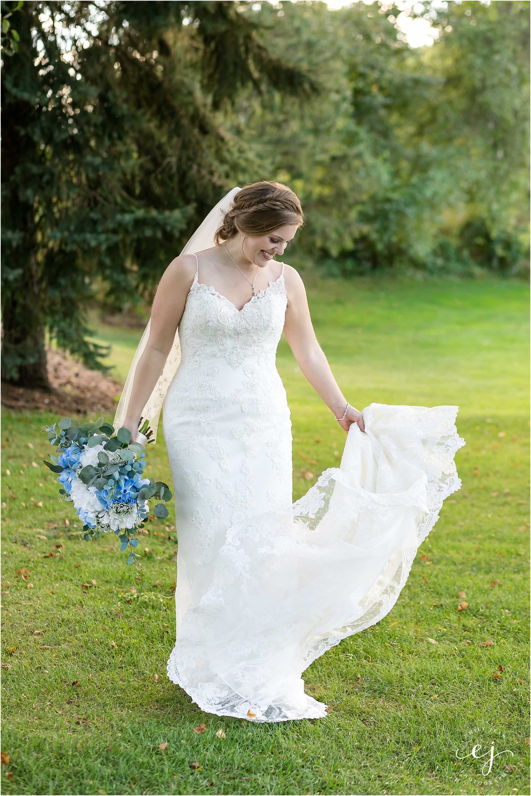 bride twirling in wedding dress at cedar creek onalaska wisconsin