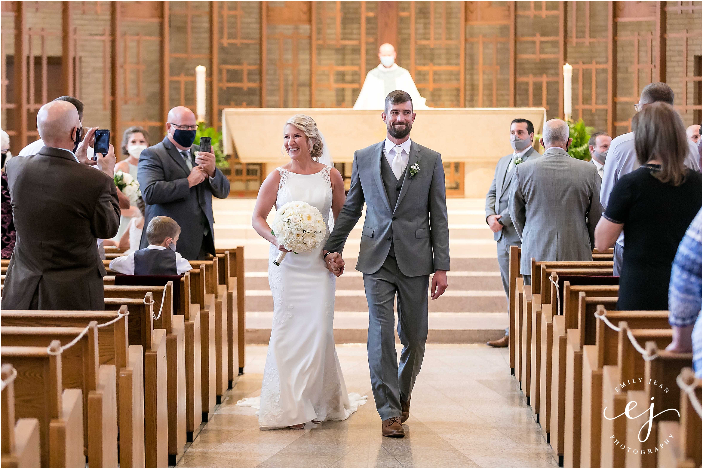 la crosse wisconsin bride and groom walking down aisle