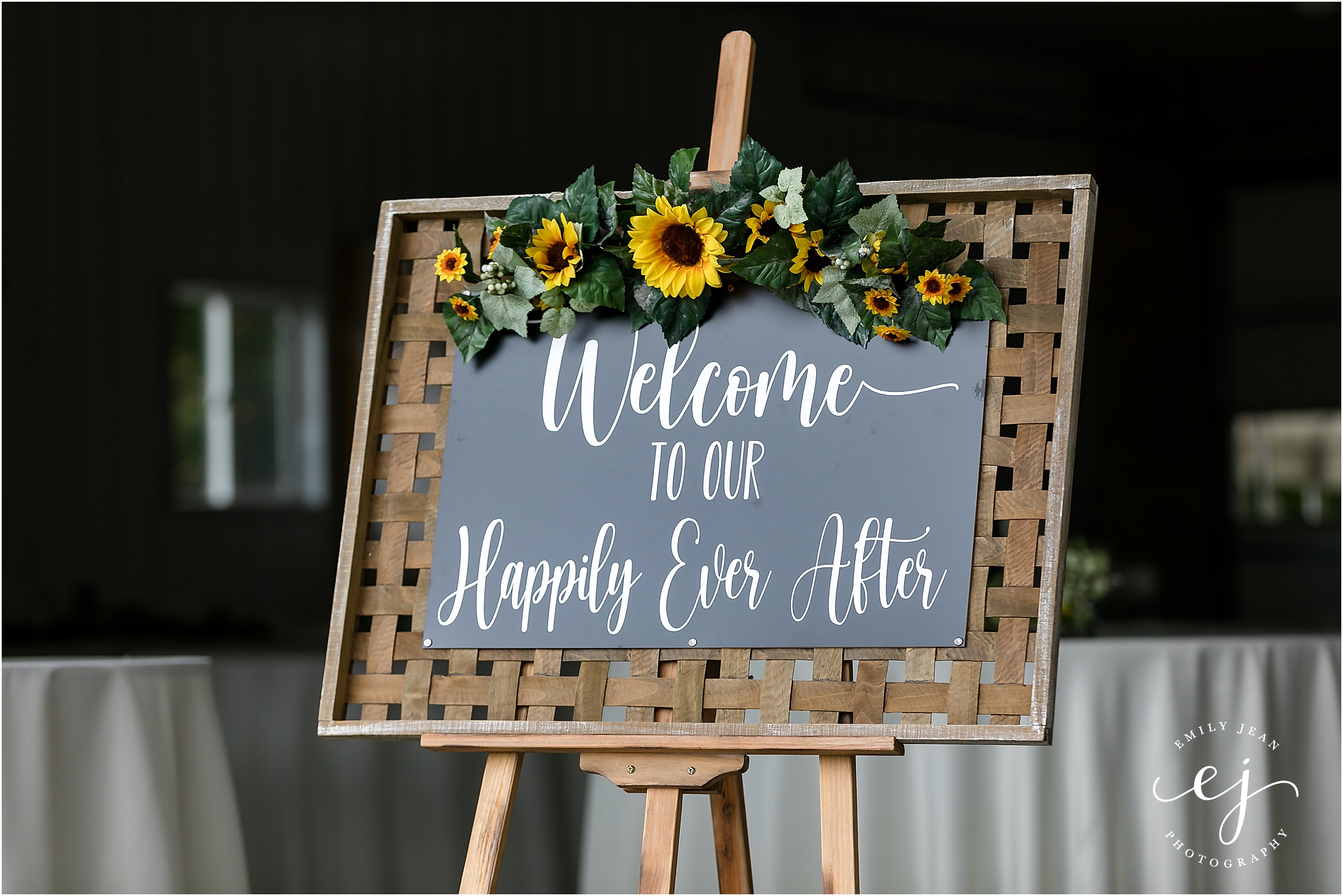 welcome to our happily ever after sign chalkboard on basket with sunflowers