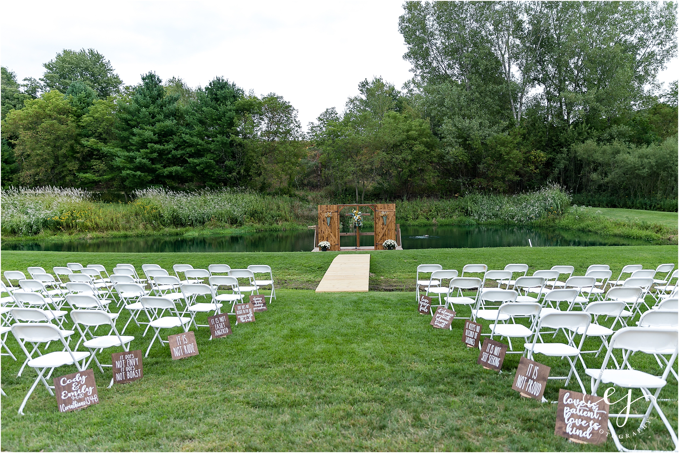 outdoor ceremony site country wisconsin wedding with wooden altar piece