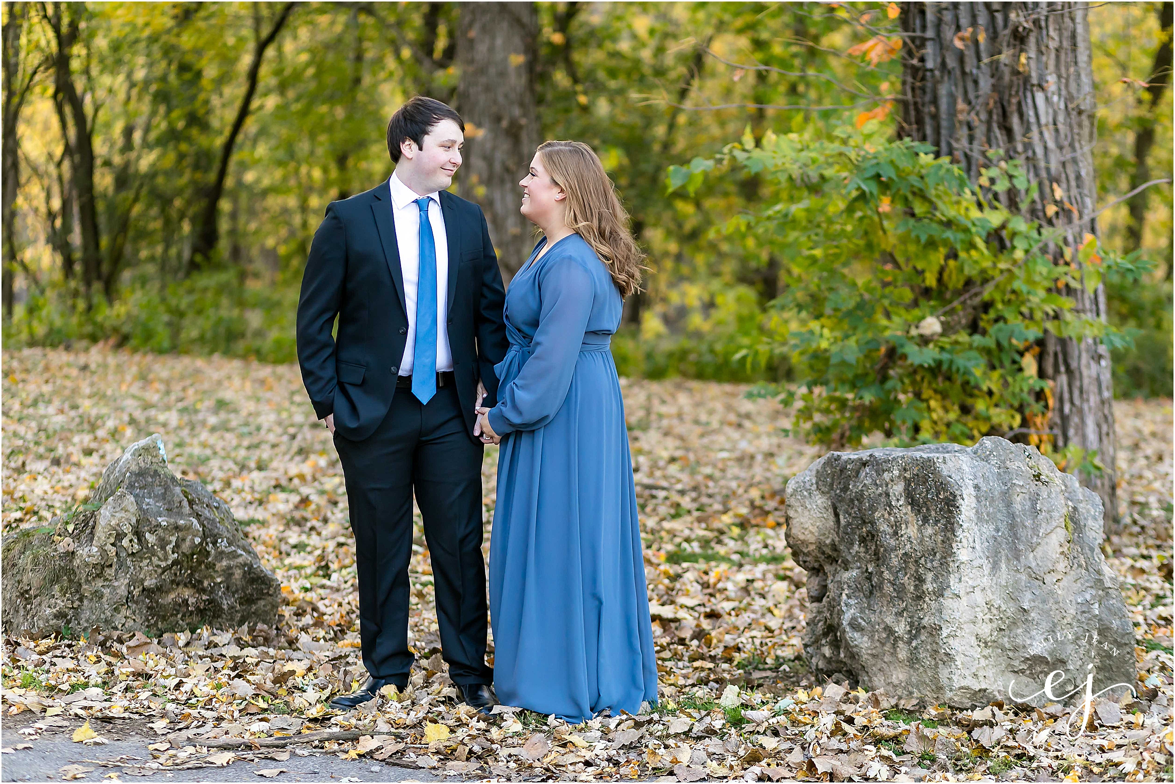 engagement session suit and tie long blue dress standing in park