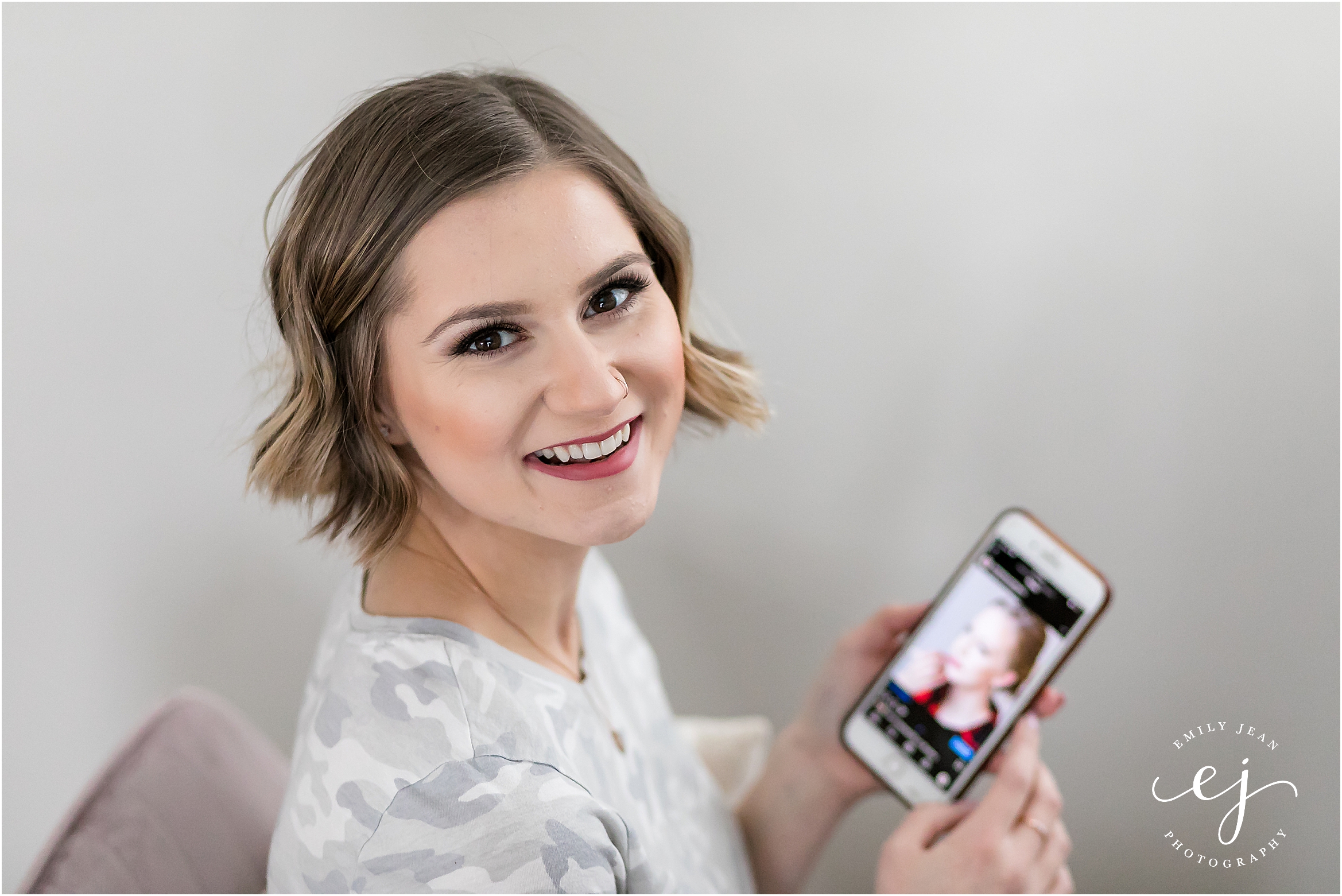 wisconsin makeup artist checking phone iphone instagram
