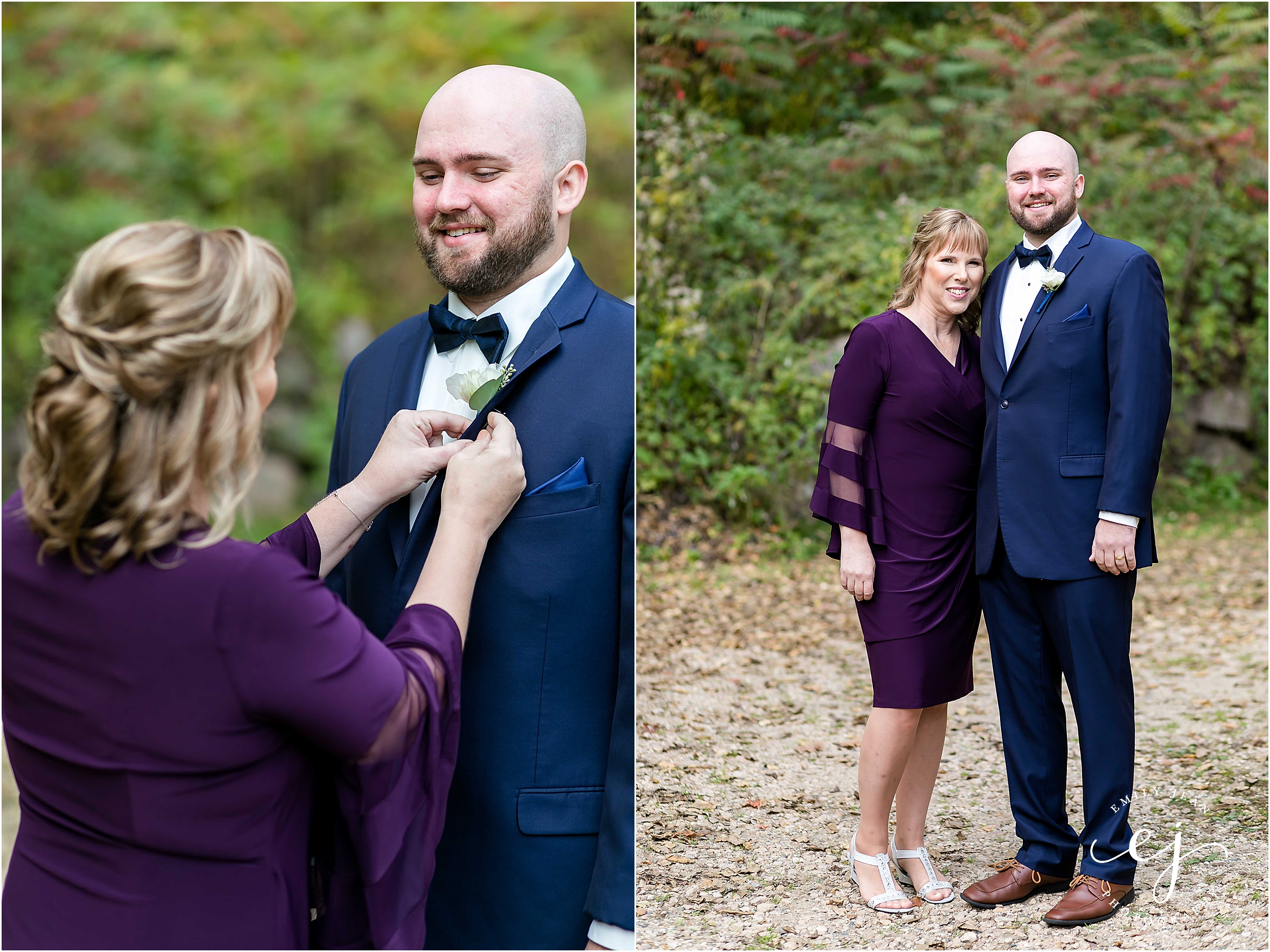 Mother of the groom wearing purple helping him put on his boutonniere at Edgewood farm