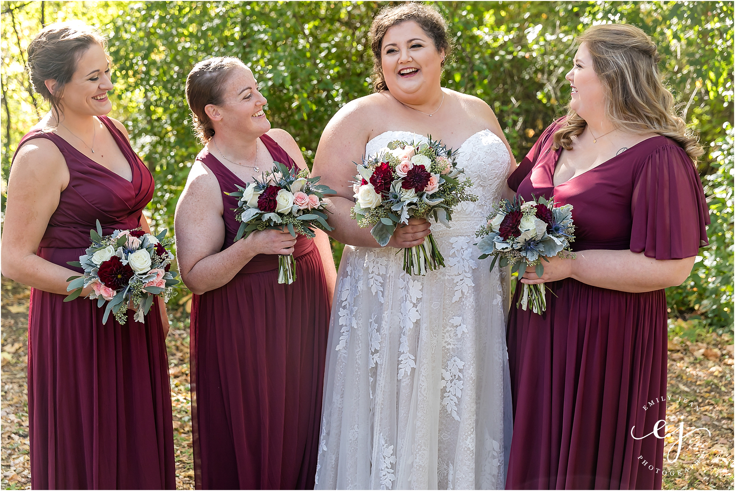 bridesmaids with burgundy dresses in different styles 