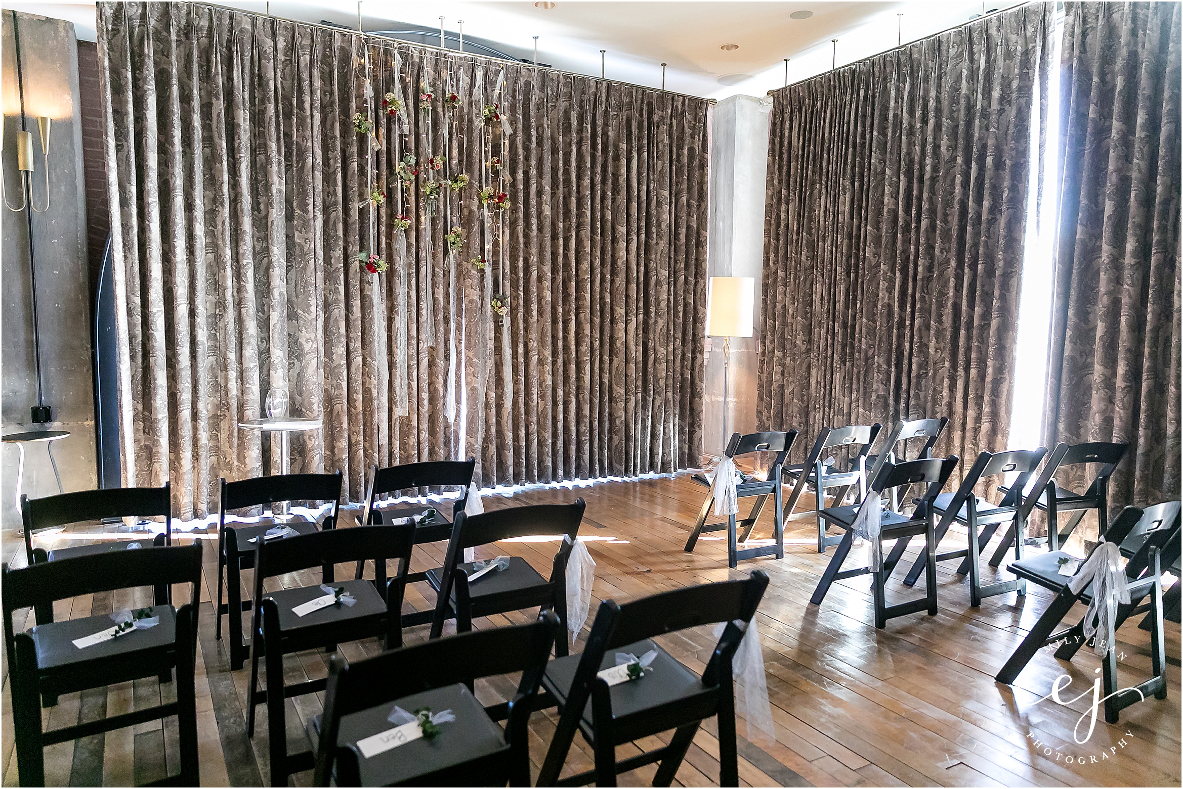indoor wedding design with black chairs