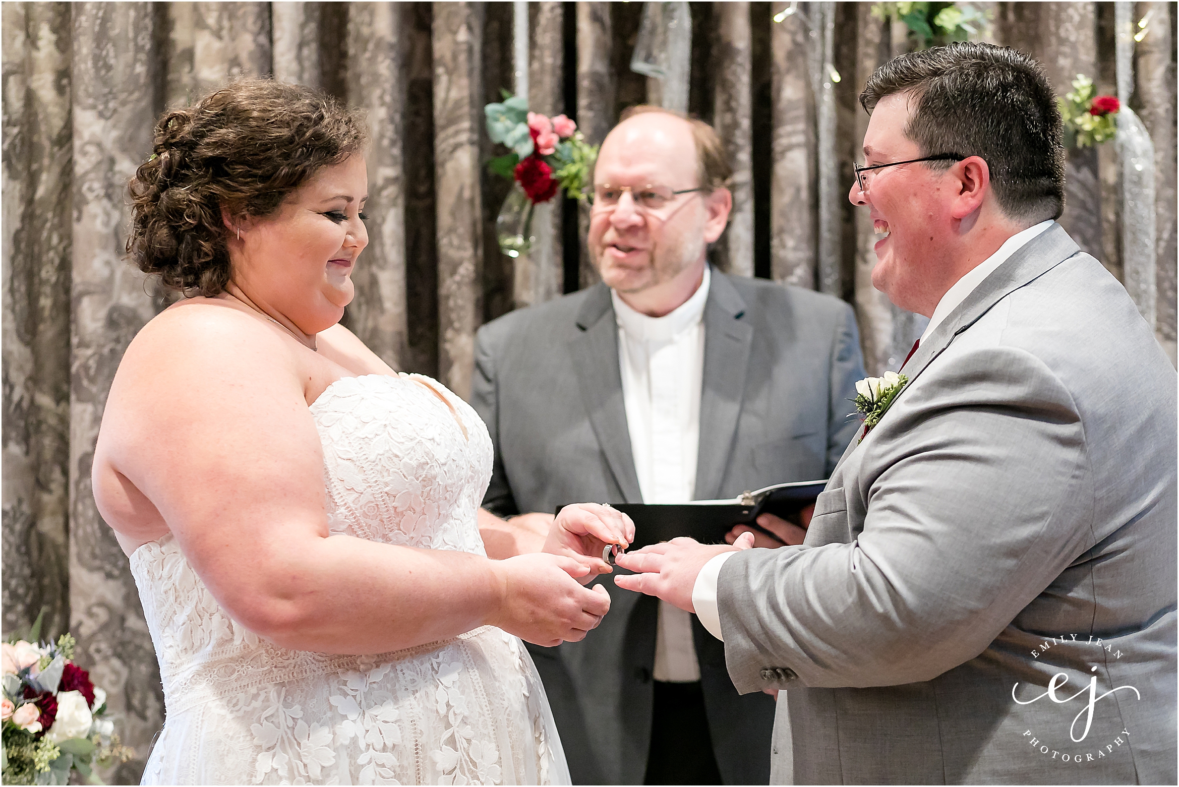 exchanging rings during wedding ceremony at the charmant