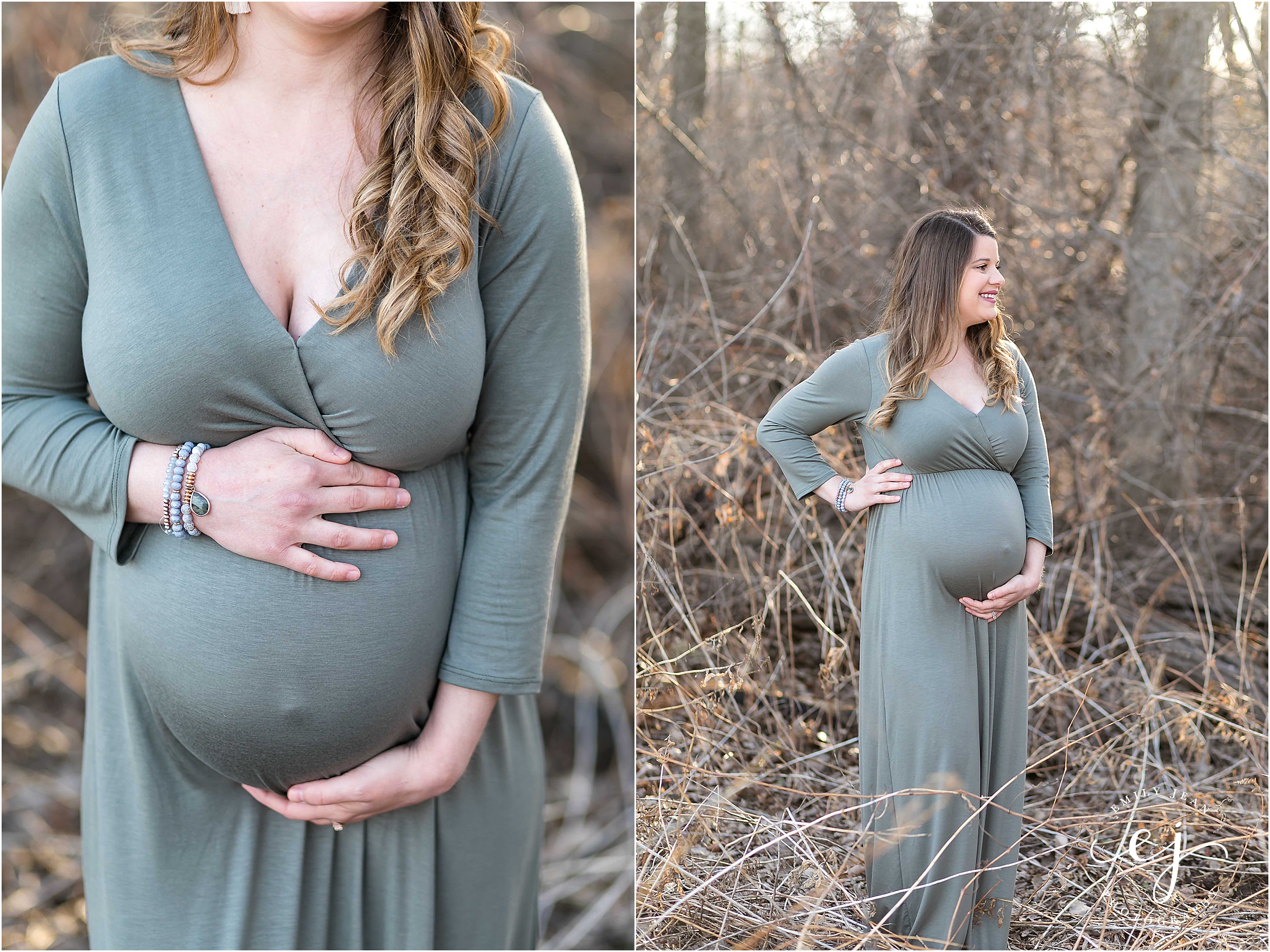 pregnant mother standing in nature spring maternity holding belly