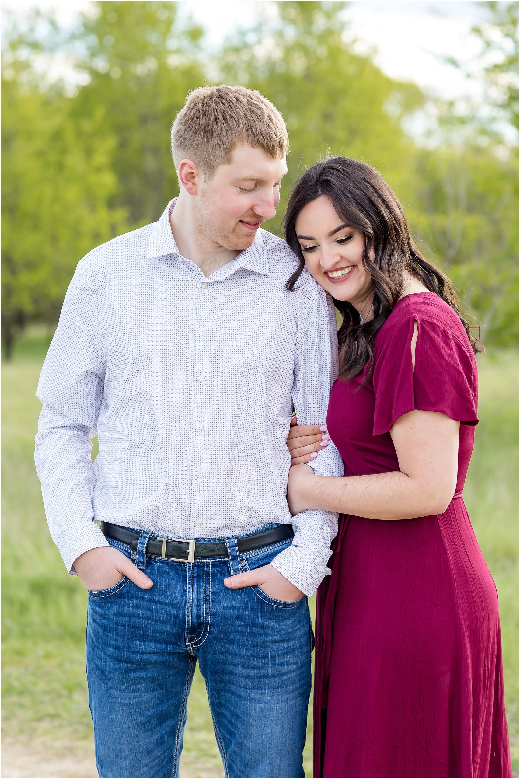 cuddle outdoors spring engagement