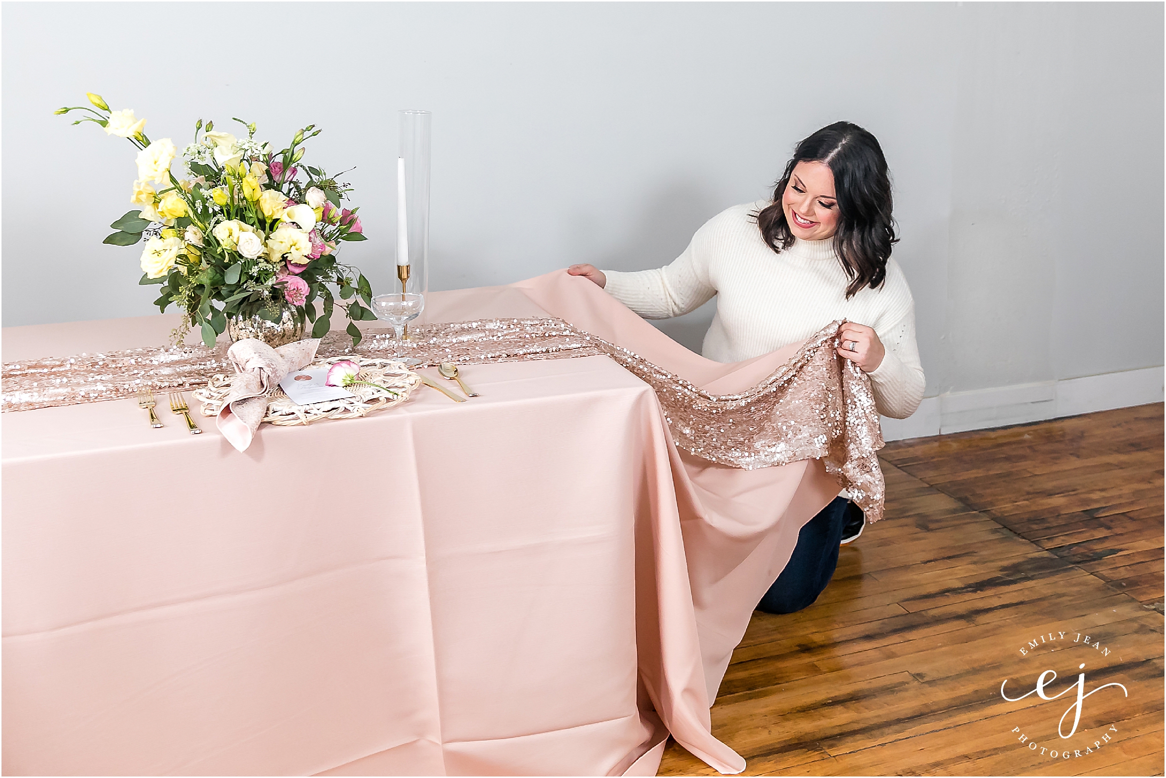 wedding coordinator fluffing table linen
