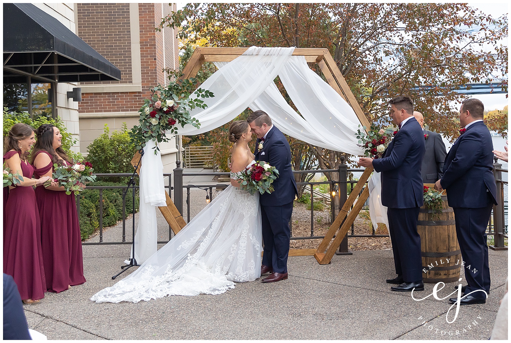 outdoor wedding arch at the cargill room first kiss