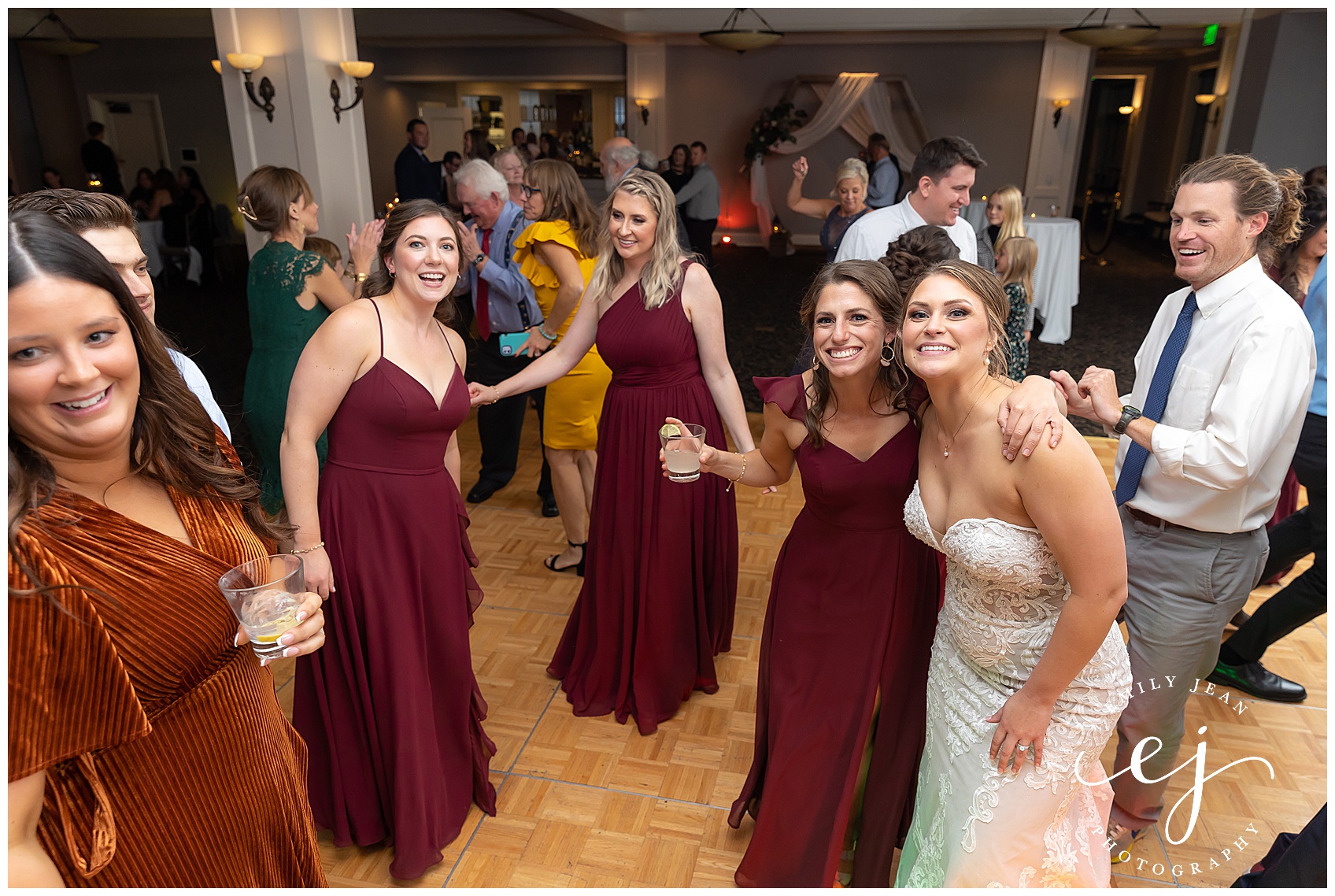 bridesmaids dancing at the cargill room waterfront wedding la crosse wisconsin
