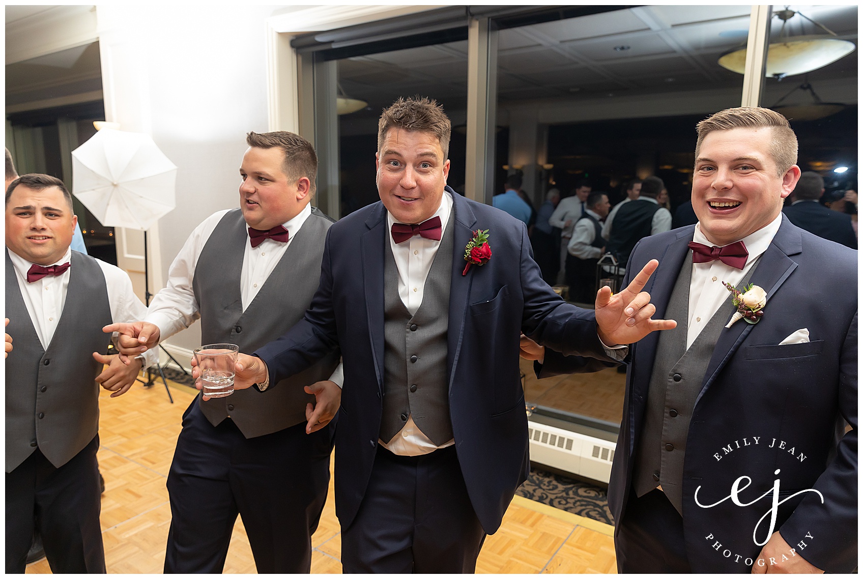 groomsmen dancing at the cargill room waterfront wedding la crosse wisconsin
