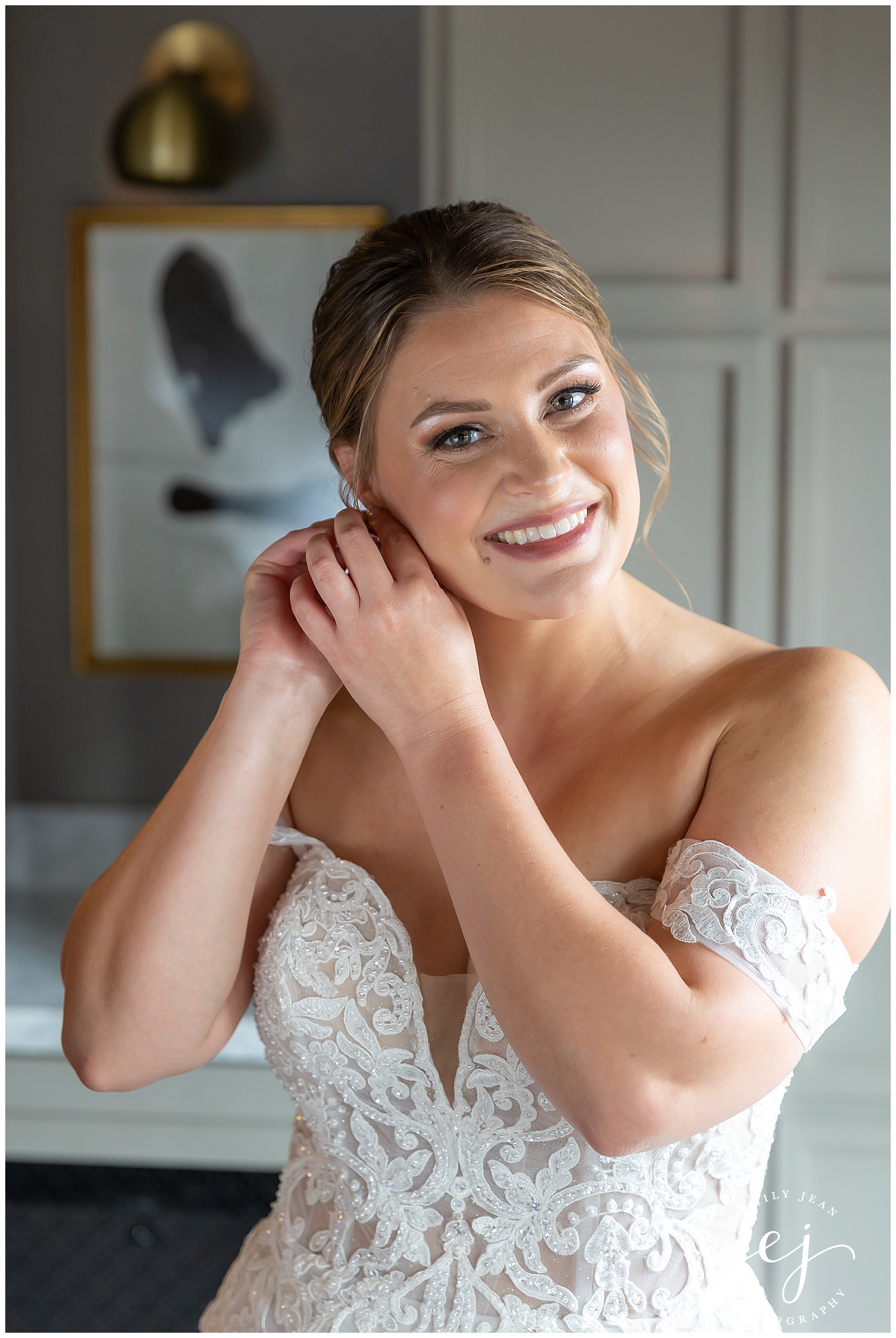 bride getting ready with lace dress at the charmant hotel la crosse wisconsin