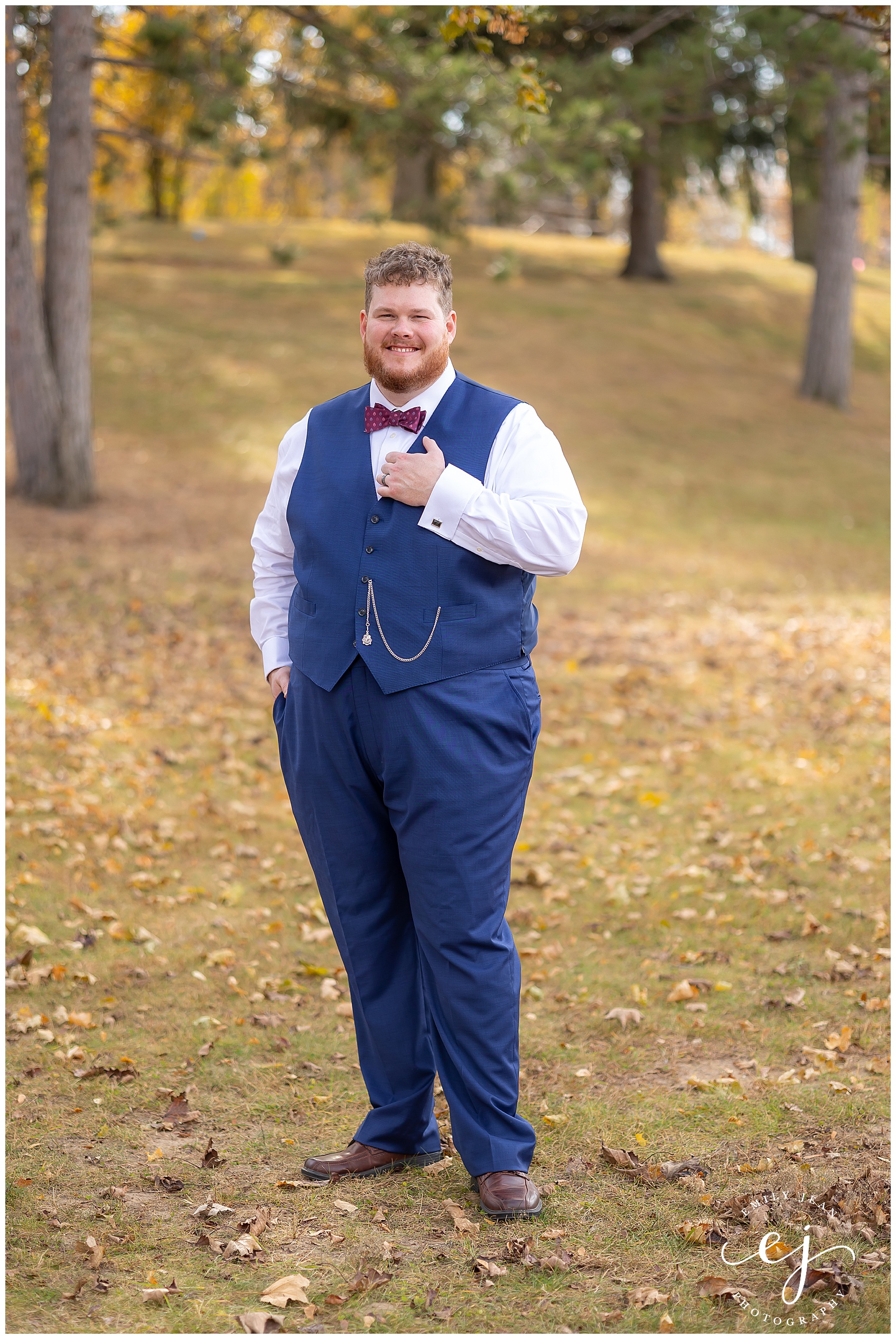 Groom with navy vest and pocket watch portrait