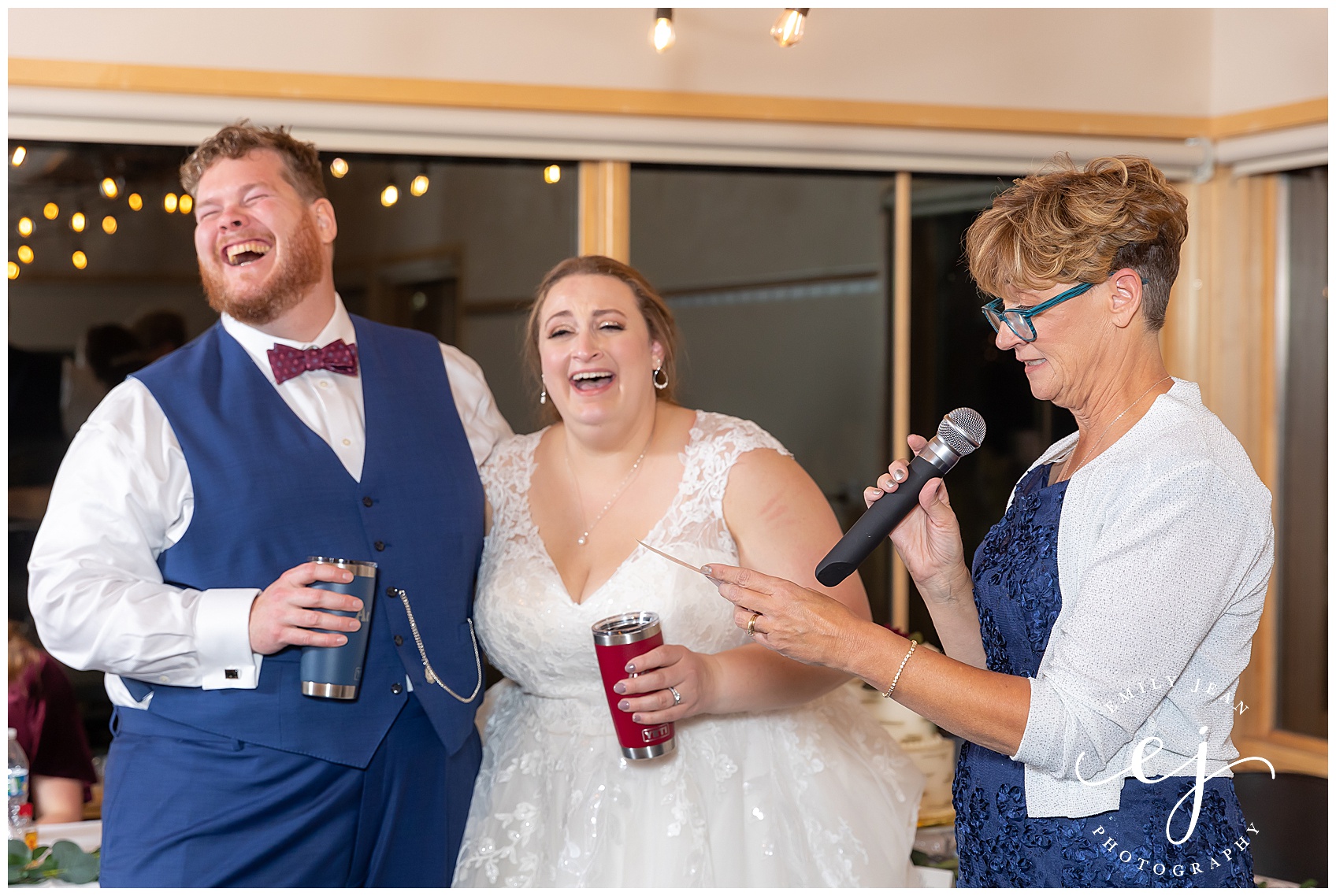 bride and groom laughing speech at wedding reception