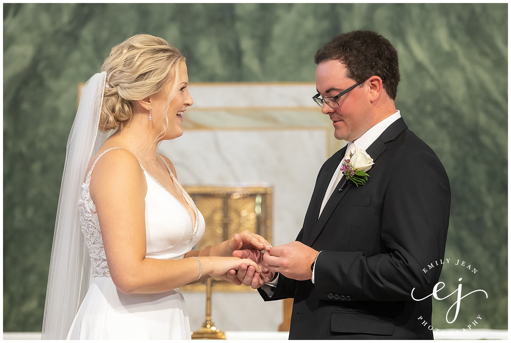 exchanging rings catholic ceremony wedding 