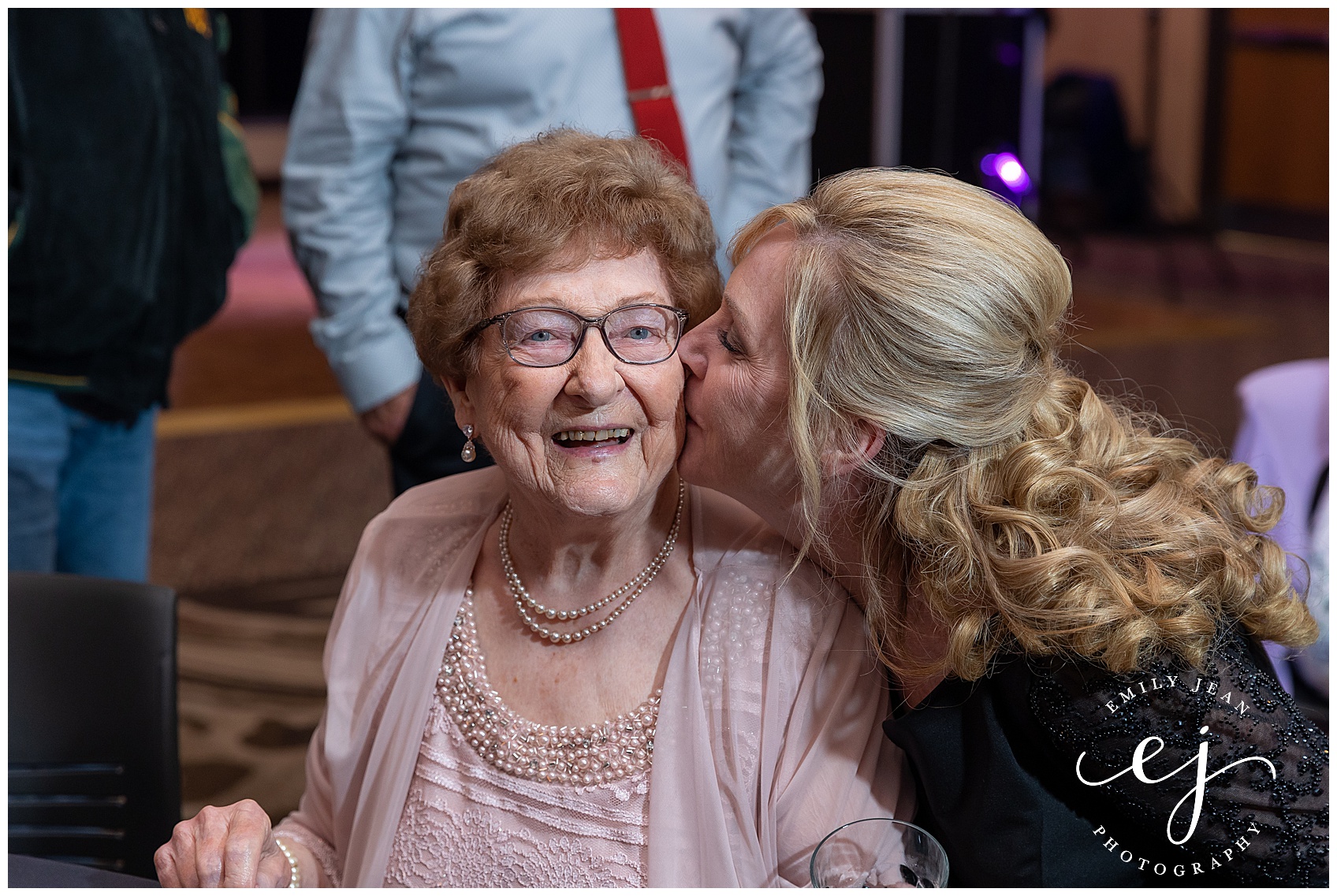 grandma kissing at wedding
