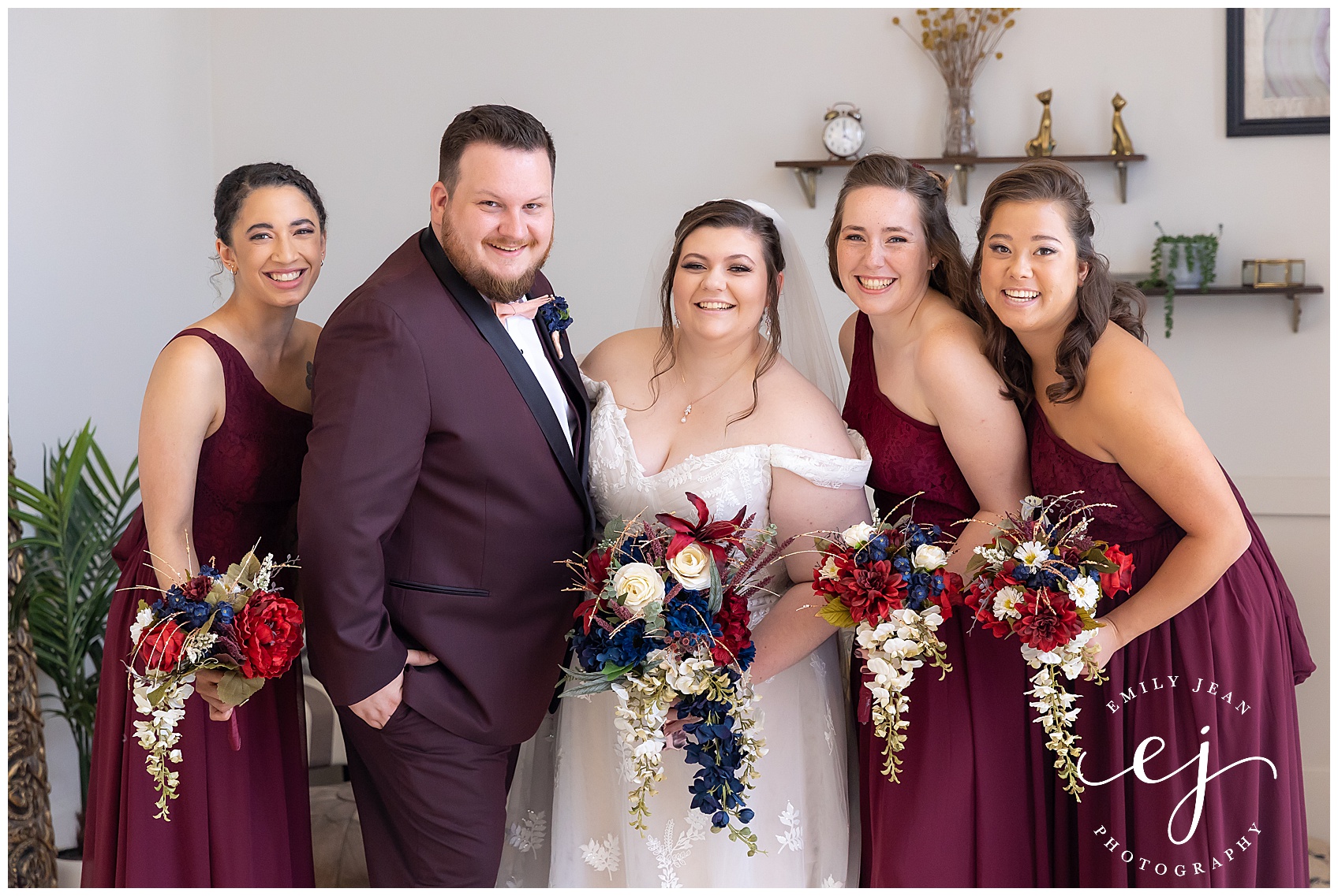 bridesmaids and man of honor in burgundy
