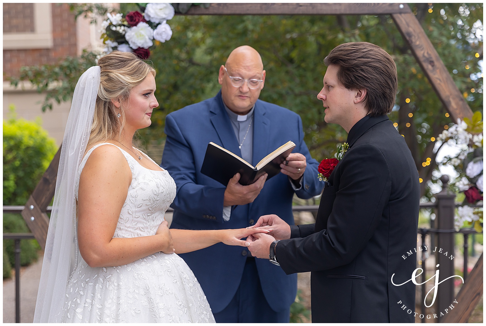 exchanging rings during wedding ceremony