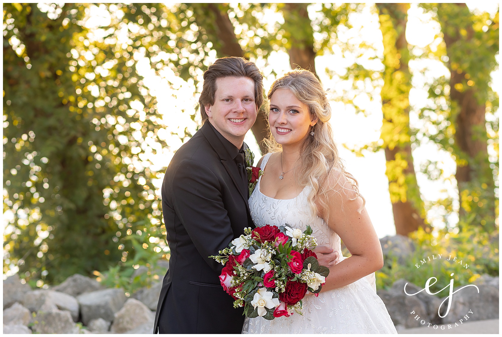 Riding room, camera, smiling classic elegant outdoor summer wedding at the waterfront