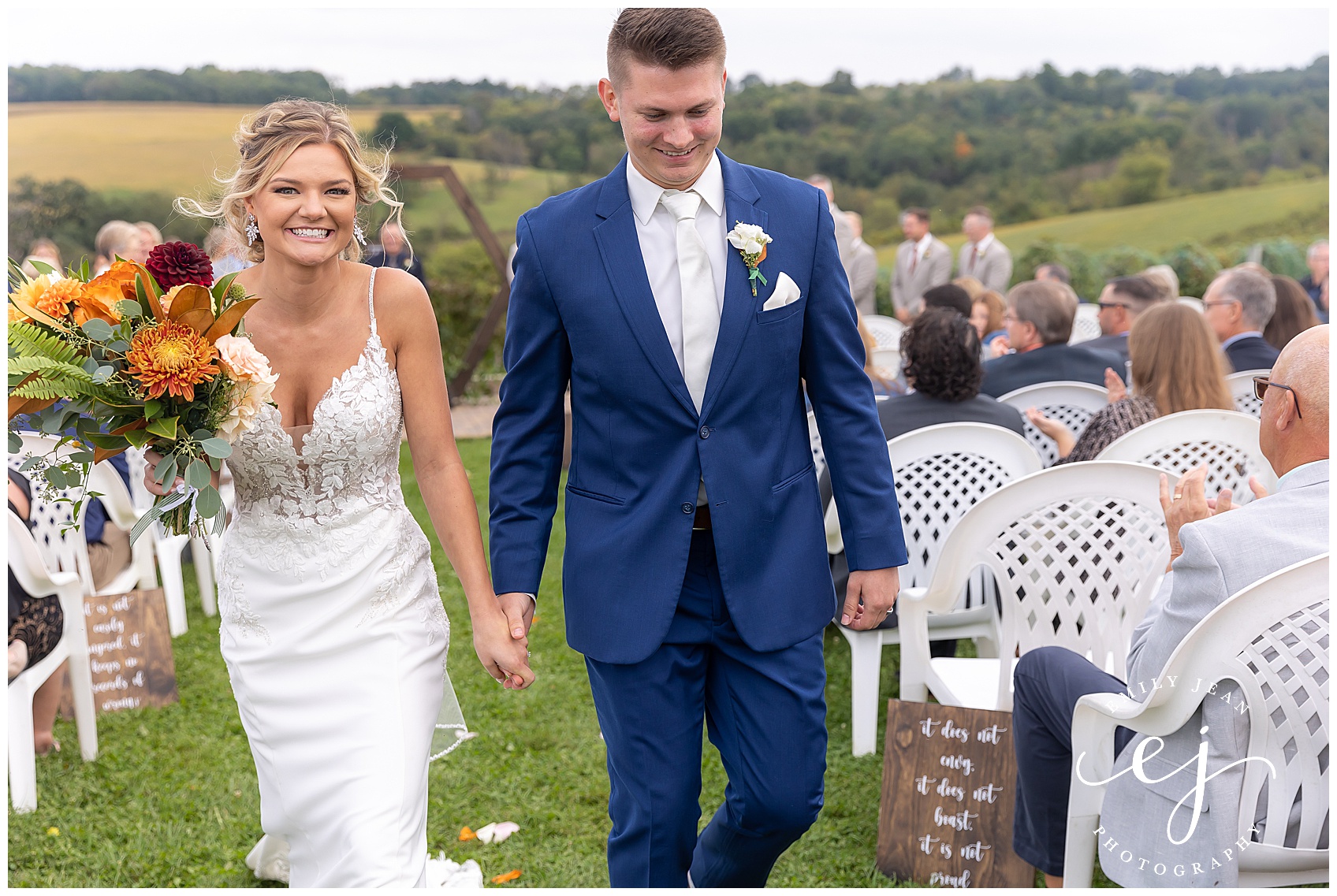happiness on bride and groom faces as they walk back down the aisle