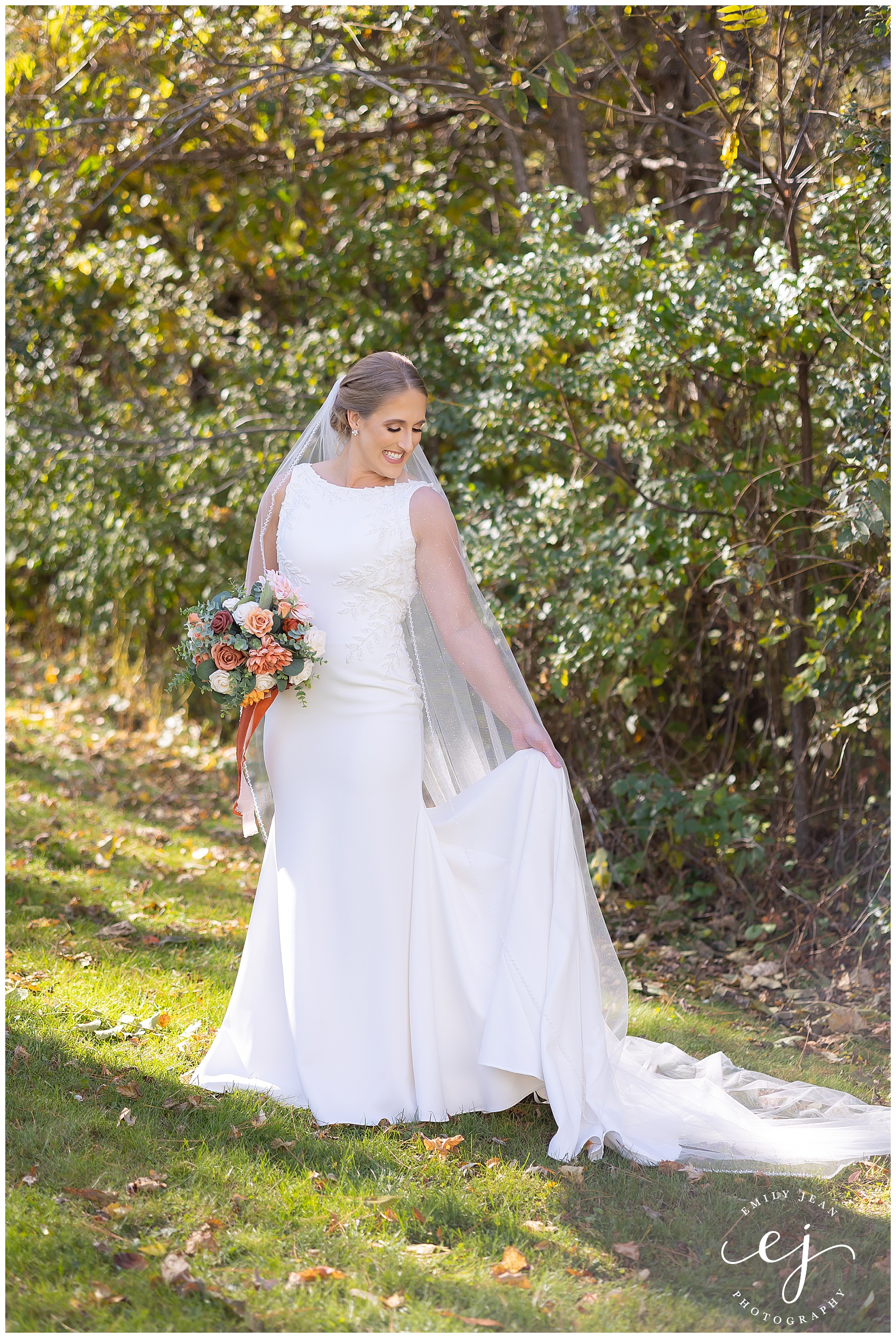 fall portrait of bride with tight white fitted gown