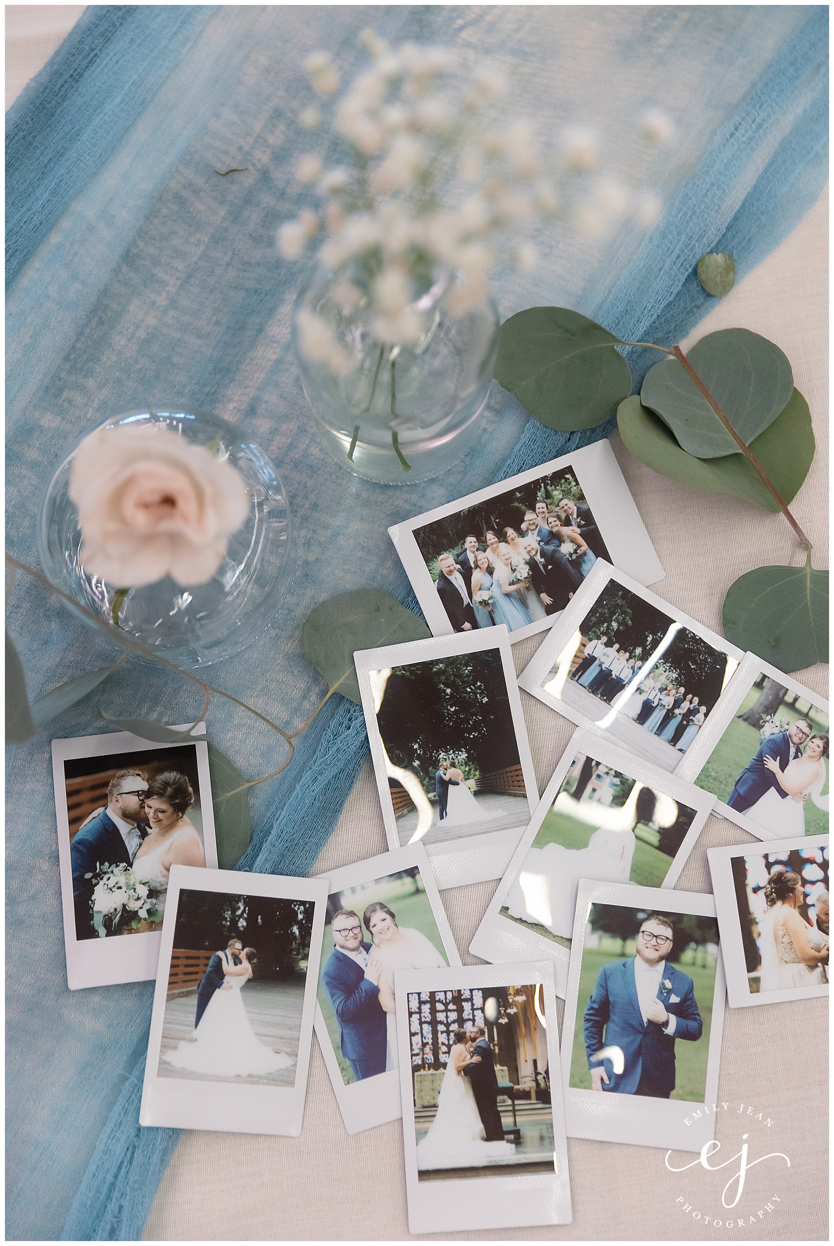 polaroid instax prints from photographer spread out on the table