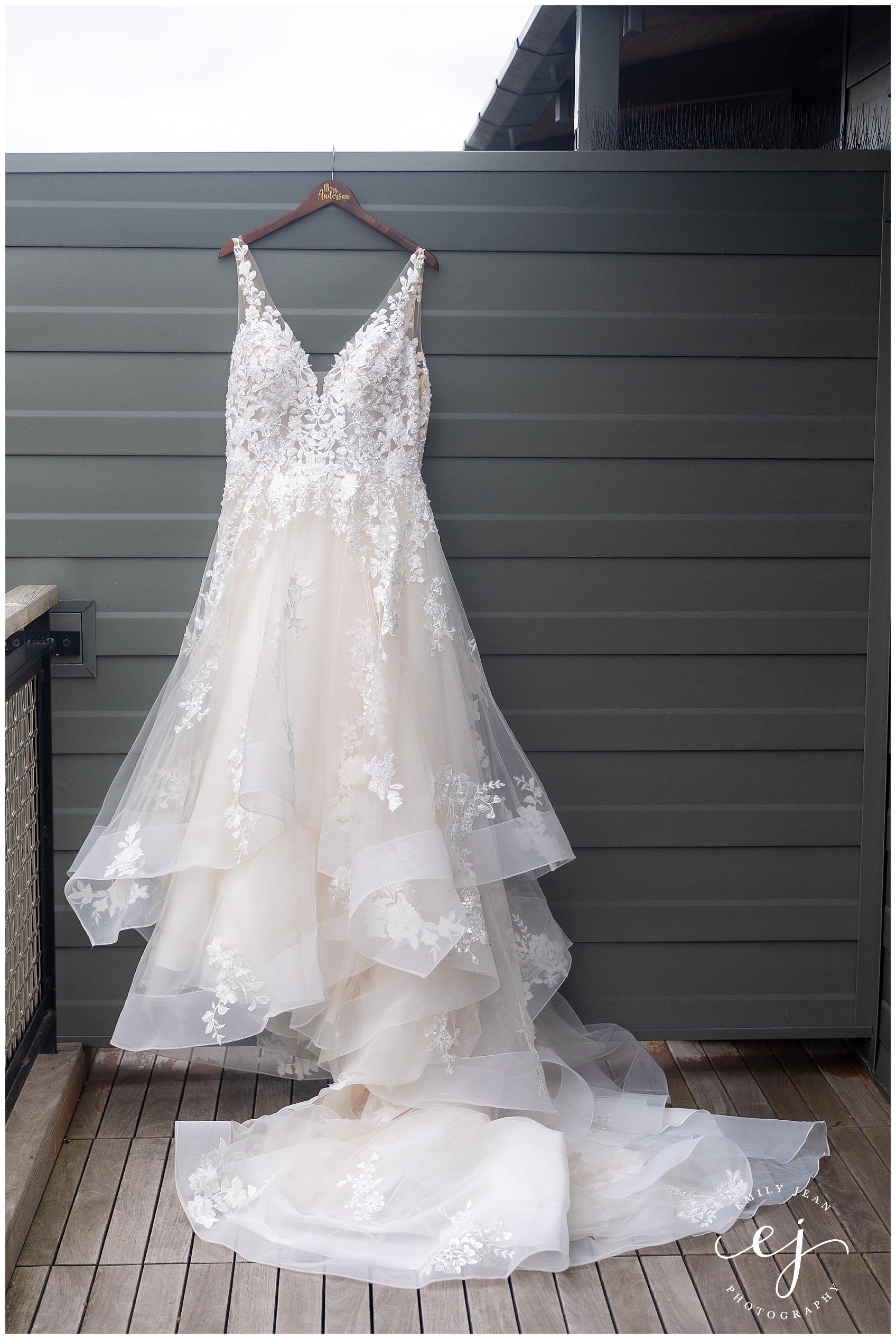 large flowy lace wedding dress with floral applique