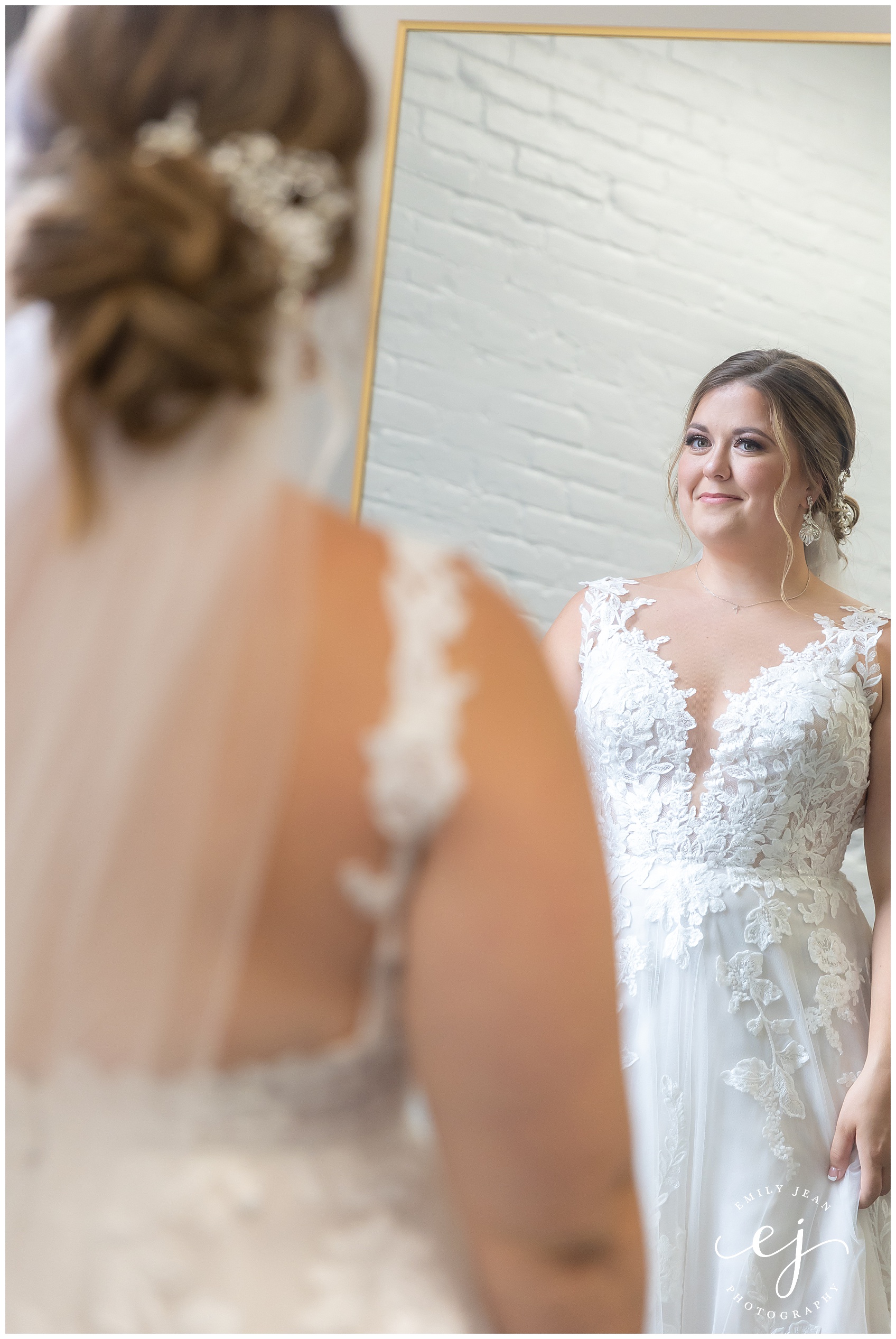 bride looking in the mirror at makeup studio la crosse wisconsin