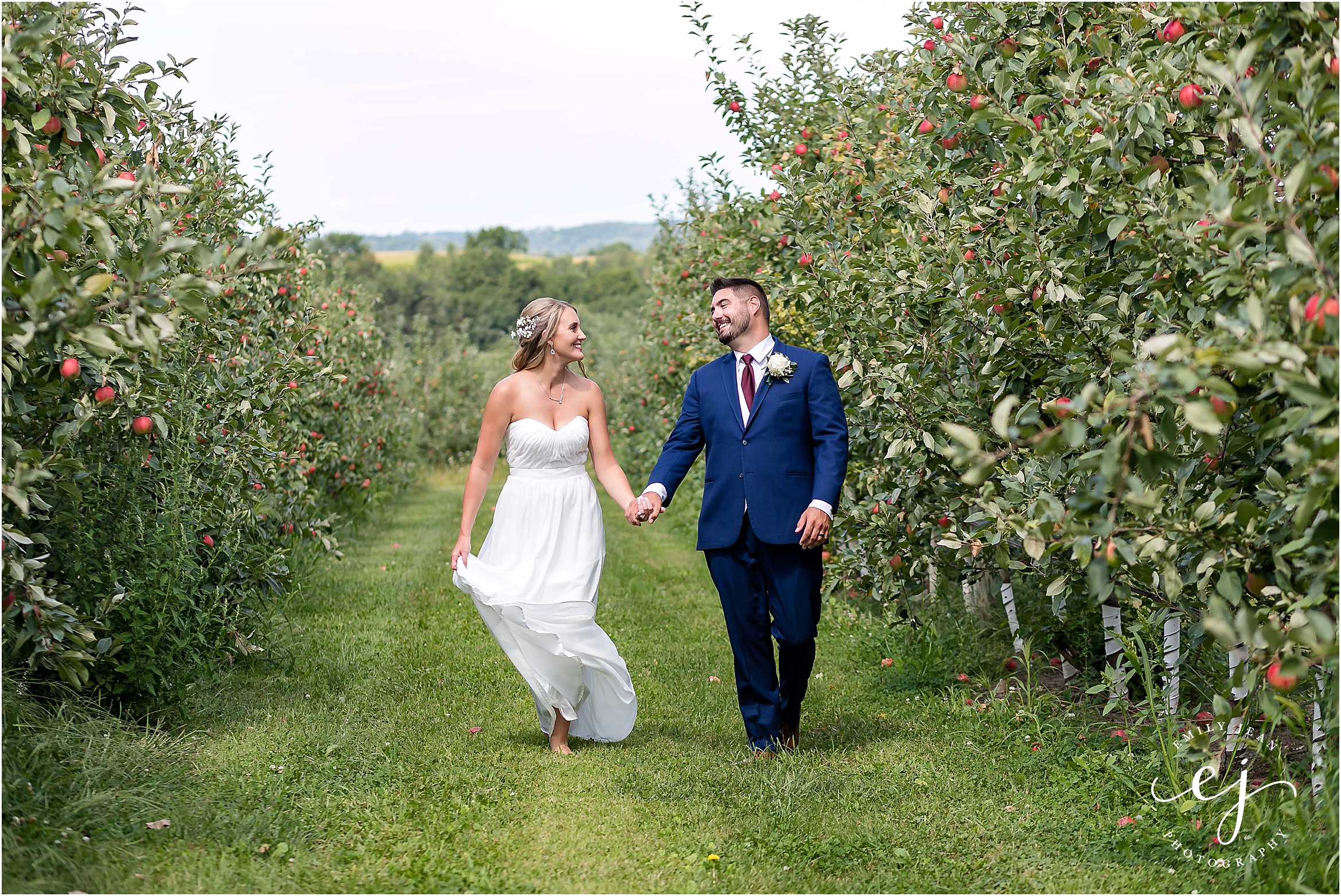 barn on southridge la crescent minnesota wedding venue bride and groom in apple orchard