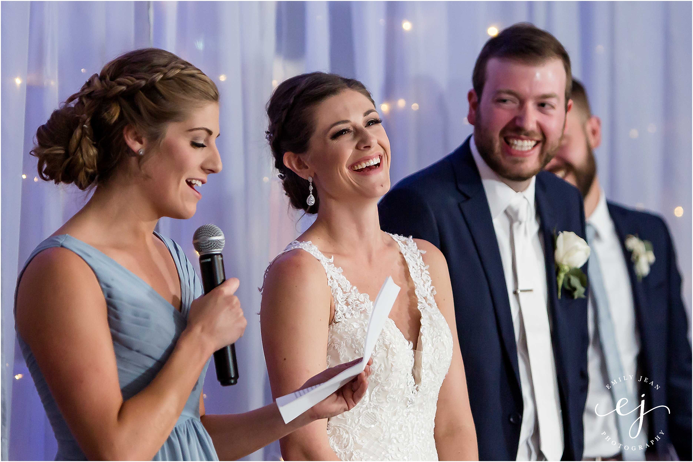 people laughing during maid of honor speech