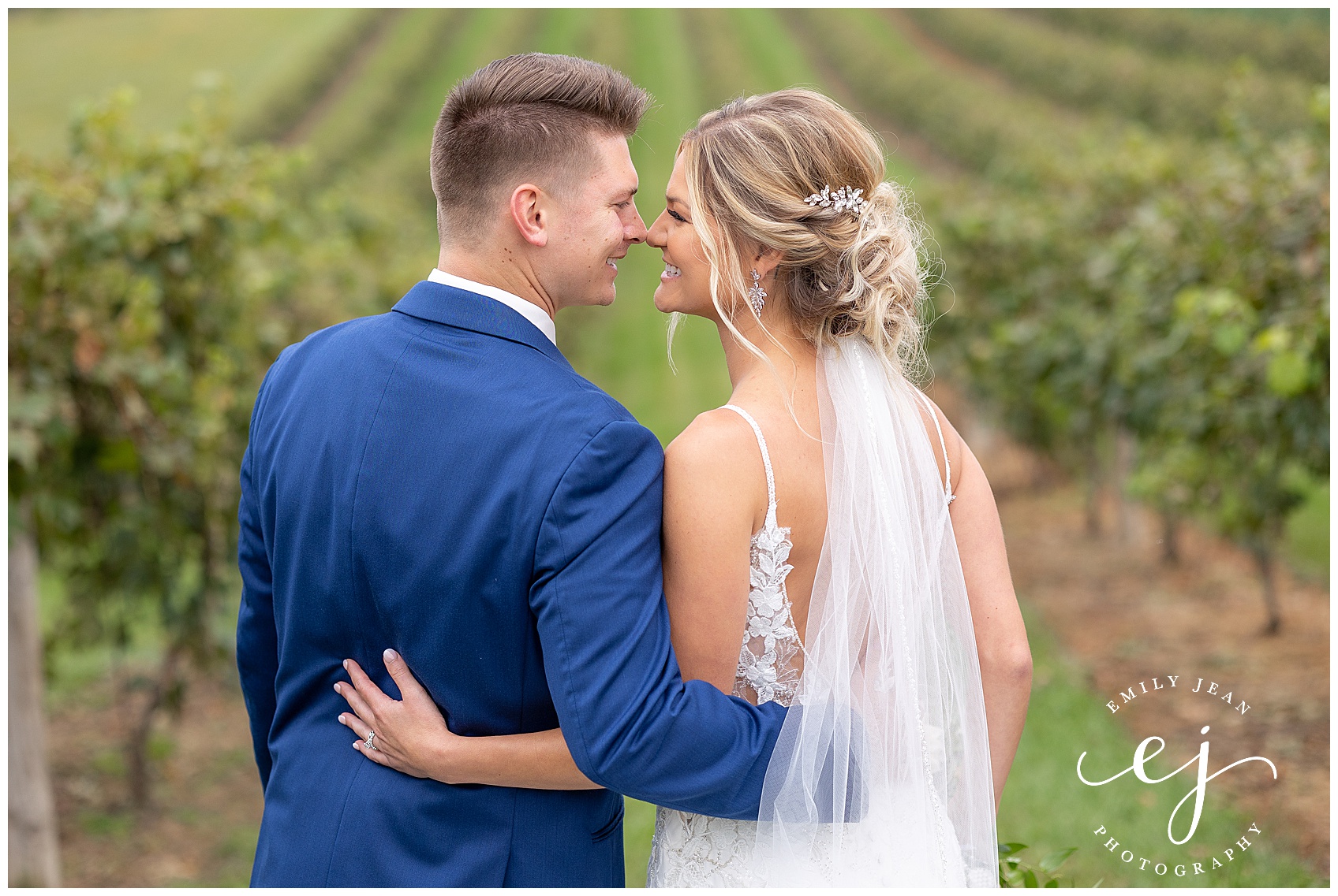 nose to nose bride and groom at vernon vineyards